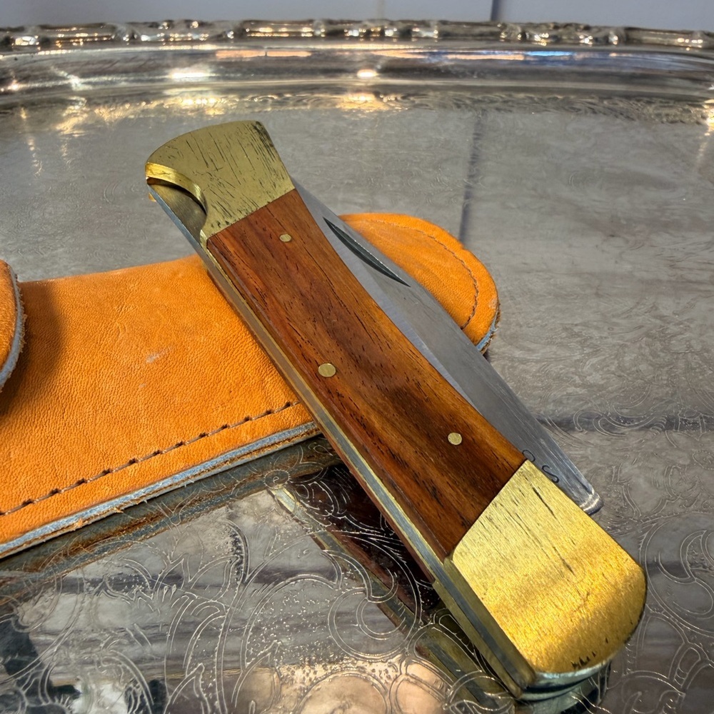 Classic Folding Pocket Knife with Wood Handle and Brass Bolsters